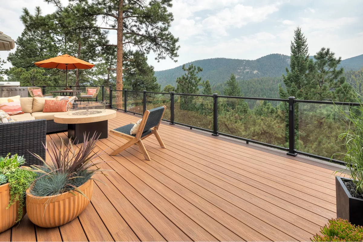 Mountain home deck with premium composite decking overlooking a rugged landscape