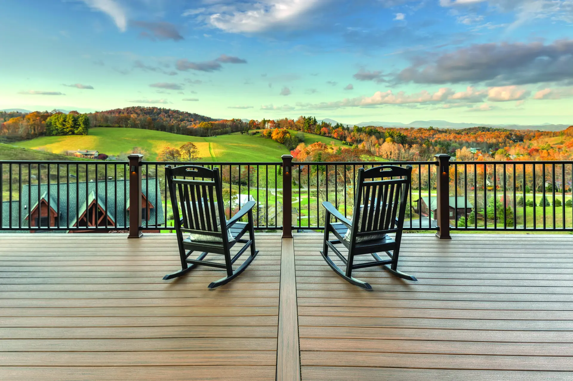 Trex Signature Aluminum Railing in Charcoal Black by the pool